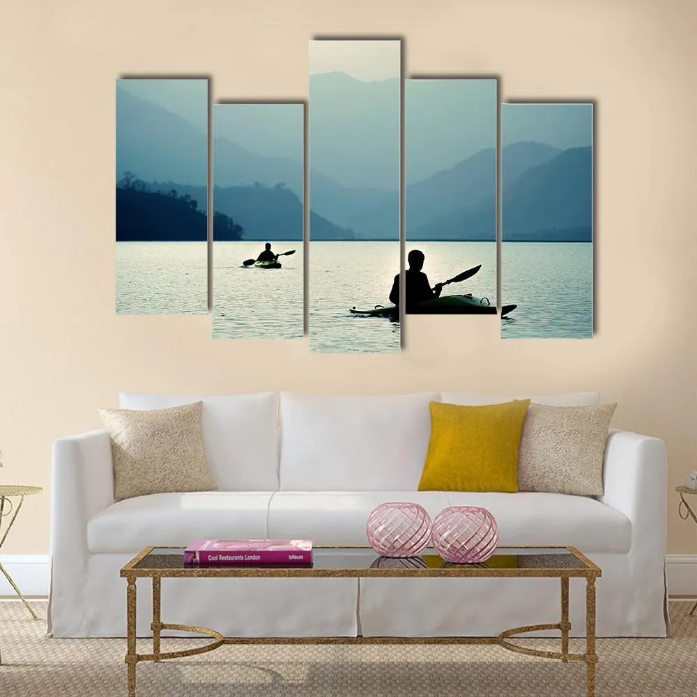 Kayaking At Sunset Canvas Wall Art