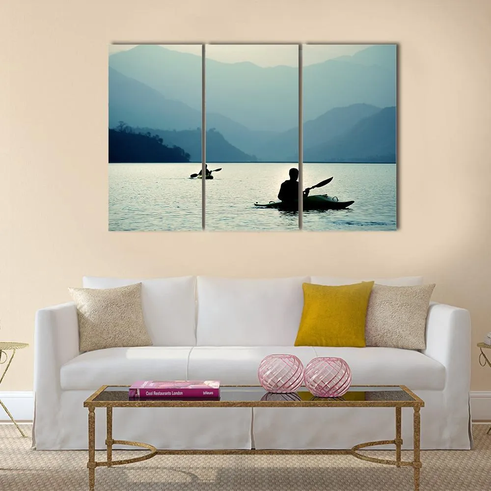 Kayaking At Sunset Canvas Wall Art