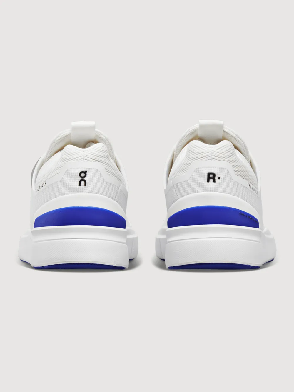 On Cloud Women’s The ROGER Spin Sneakers- White/Indigo